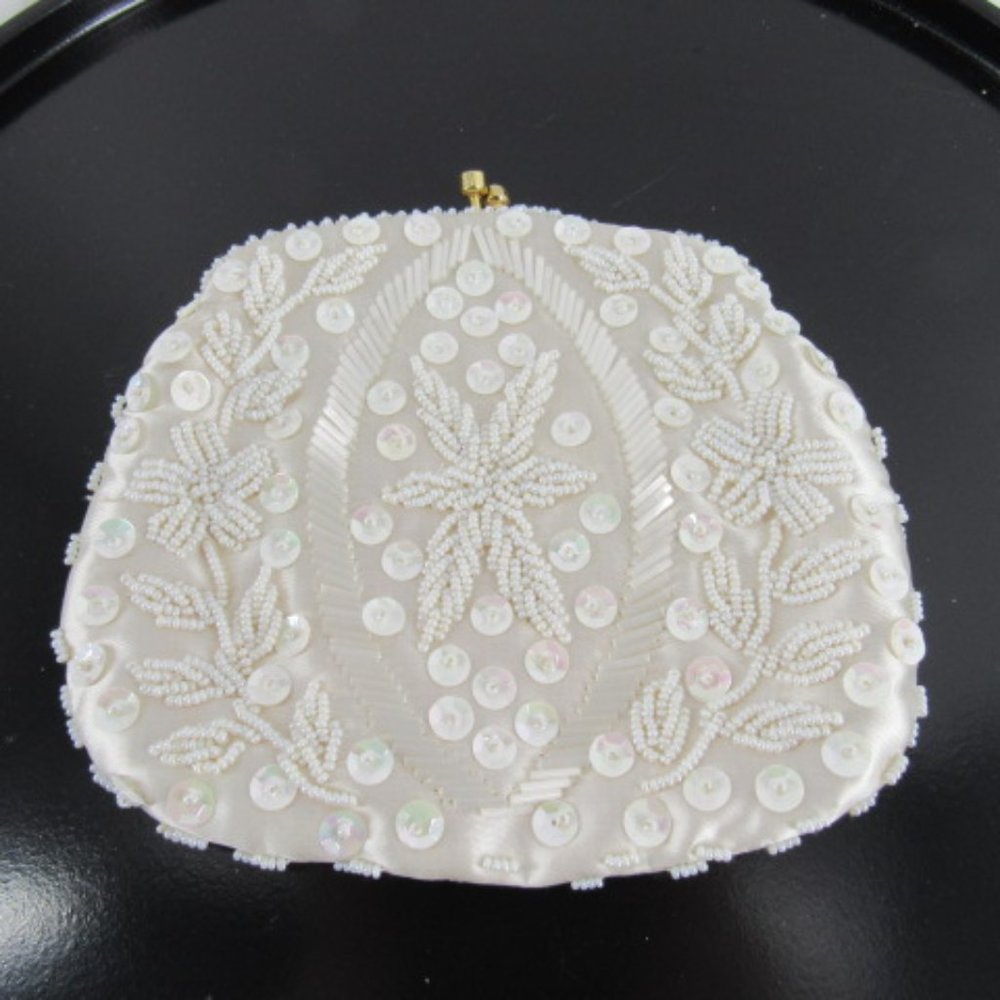 ivory beaded/sequined clutch